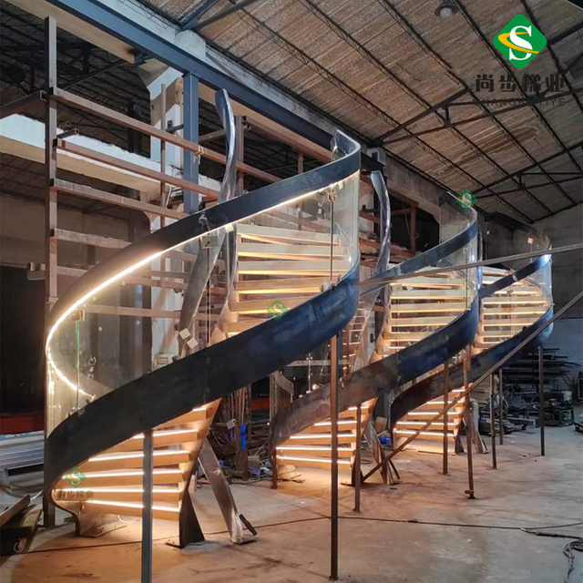 尚步梯业厂家设计定制生产钢结构钢木螺旋旋转轻奢楼梯