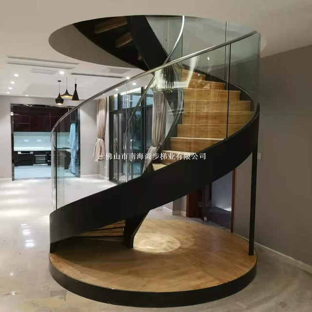 佛山尚步梯业厂家定制生产室内螺旋旋转钢木弧型别墅楼梯